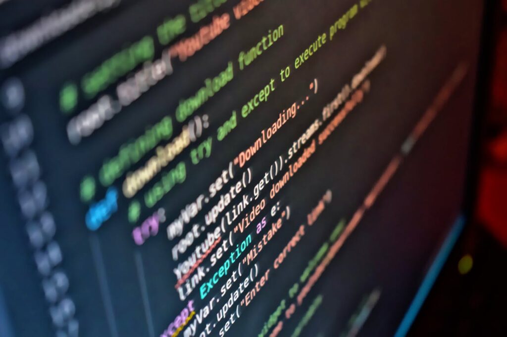pexels photo 4955393 Vivid close-up of code on a computer screen showcasing programming details.